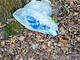 Electric cables covered by a carrier bag that would not be keeping any water out