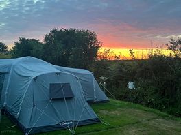 The beautiful sunset across the fields