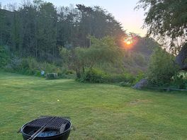 Sun going down over site