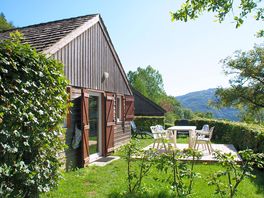 Lodge with deck and outdoor furniture