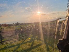 Surrounded my peaceful fields.