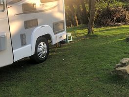 Parked alongside the river