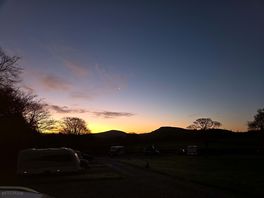 Sunrise over hartington hills caravan park