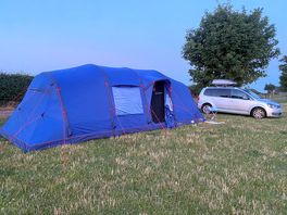 Space on pitch for 8 man tent and the car and for cooking between car and tent