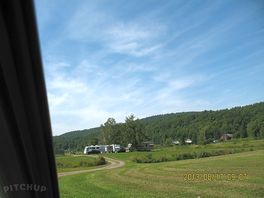 Tenting spots in the meadow and in the wooded areas