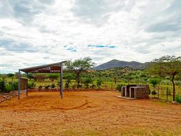Sand pitch with shelter, barbeque facilities, wash-up basin and electric connections