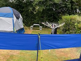 Good size. camper, awning and lots of space to spare