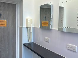 Toilet/shower block