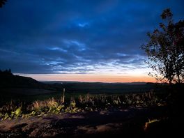 Evening view through campsite gateway