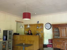 The lovely owner making their delicious signature negroni