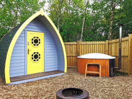 Forest camping pod with wood fired hot tub