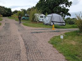 The grassy areas for awnings is on a slope, but with a bit of skill, is manageable!