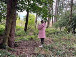 Daughter exploring and gathering wood