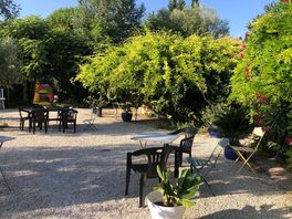 Photo of the seating area near the pool.