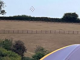Red arrows over the campsite