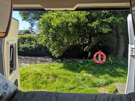 Parked on riverbank
