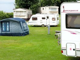 Electric grass tent pitch