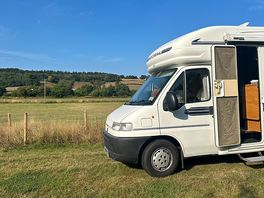 View of our motorhome at the edge of the orchard