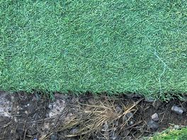 Another picture of the stones & concrete underneath the astroturf.