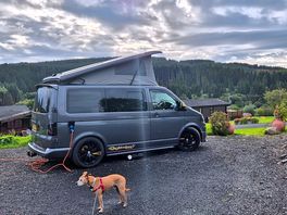 Lola the camper and frankie the dog, all parked up in space number 2