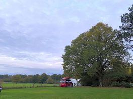 Van in camping field