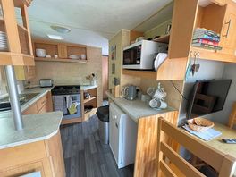 The kitchen contains everything necessary for an avwrage day of cooking and/or baking