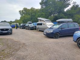 Lots of vehicles parked onsite