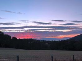 Stunning sunset views over the hills and sea.