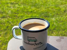 Morning coffee with green landscape