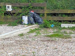 Rubbish left by previous campers.