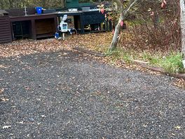 Hard standing pitch showing electric hook up and dishwashing unit