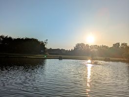 Evening walk on the fishing lake