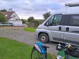 Our pitch with toilet block on the left and a distant view of the sea