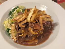 Lambs liver and mash with cabbage and crispy parsnip