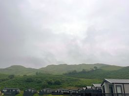 View of the caravans and highland cow feilds