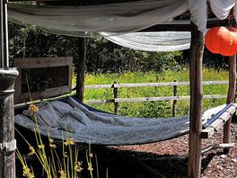 Day bed to relax in water garden