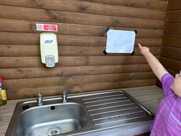 A budding artists picture in the washing up area.