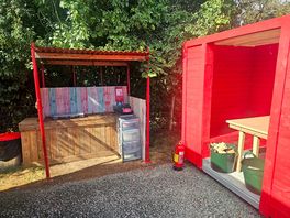 Kitchen area and undercover seating area.