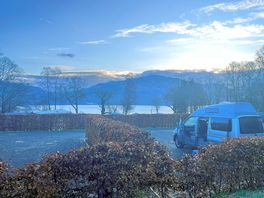 View of the pitch and loch lomand and beyond.