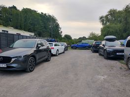 Campers' vehicles parked onsite