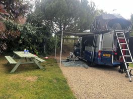 Camper on fully serviced pitch
