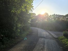 Just outside the site.