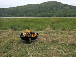 Bbq by the tent with a fantastic view of the lake