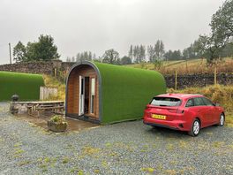 Camping pod with car park next to it