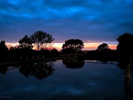 Night falls over the lake.