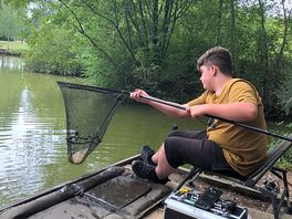 My son bringing in one of many catches of the day!