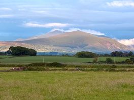 The view towards the snowdon range from the site.