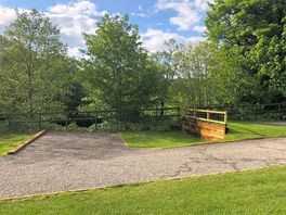 Electric hardstanding and grass motorhome pitch