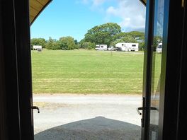 View of campsite from inside pod