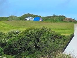 Our tent from the road from the beach